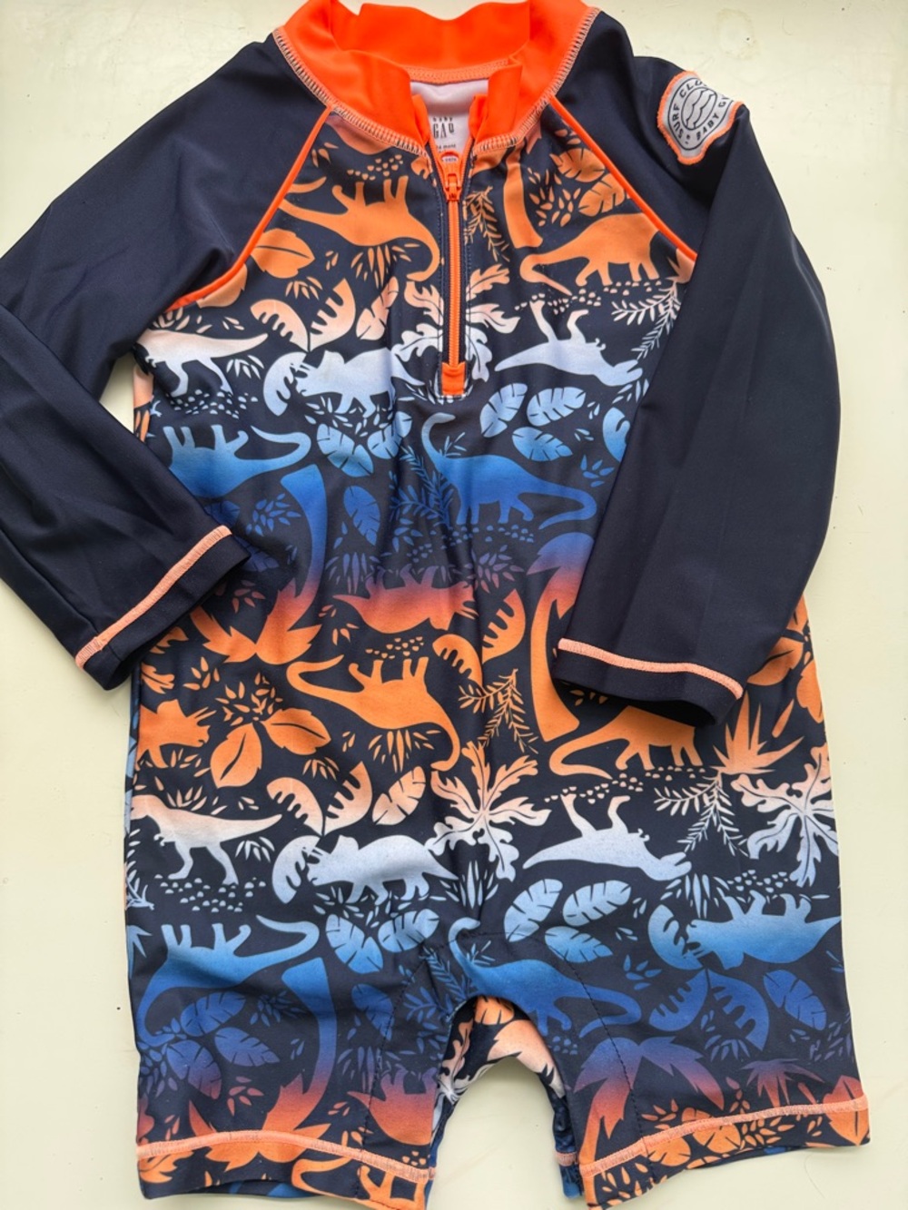 GAP Kids Long Sleeve One-Piece Swimsuit - Navy with Orange & Blue Dino Print
